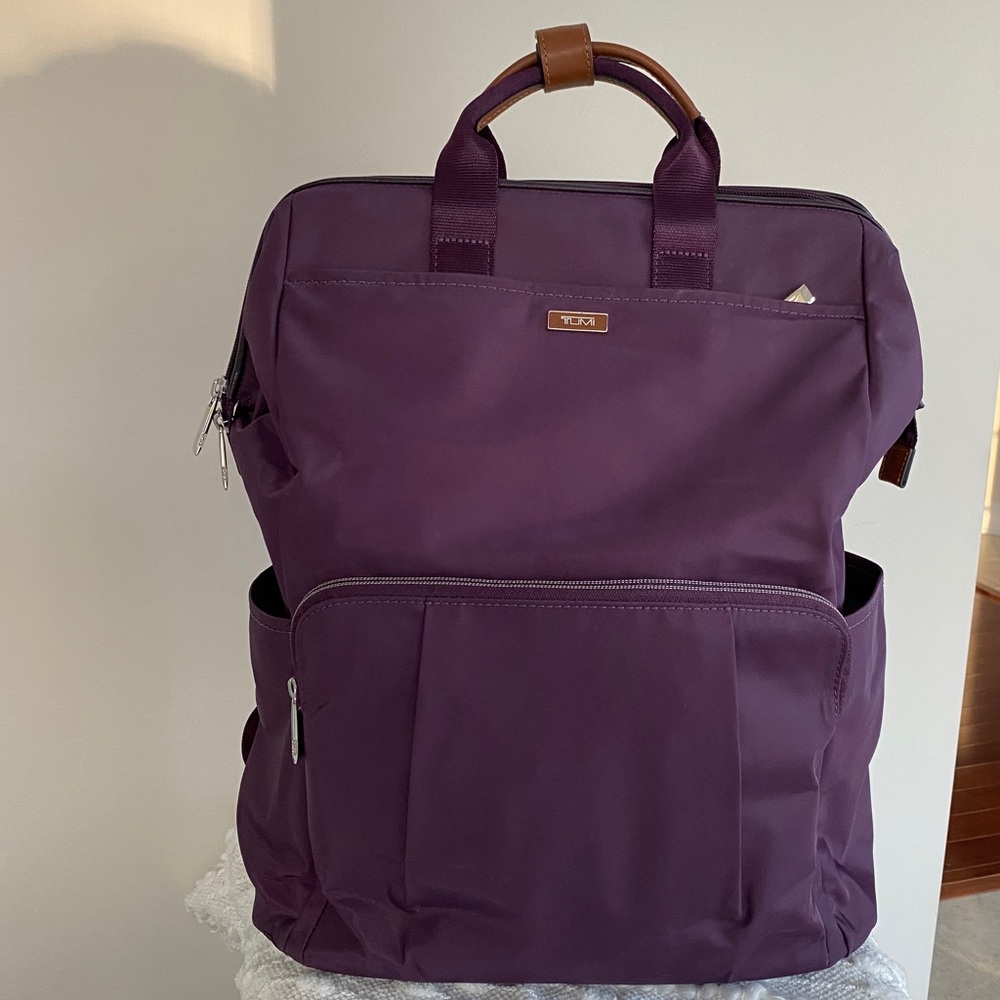 TUMI purple framed opening laptop backpack